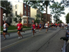 Media Five Mile Racers running down State Street