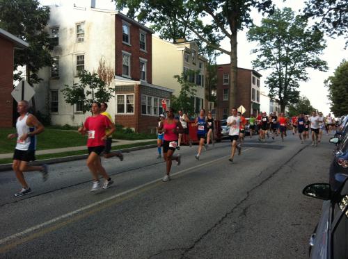 Media Five Mile Racers running down State Street